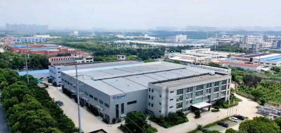 Aerial view of the Handingsheng factory building in Kunshan surrounded by greenery